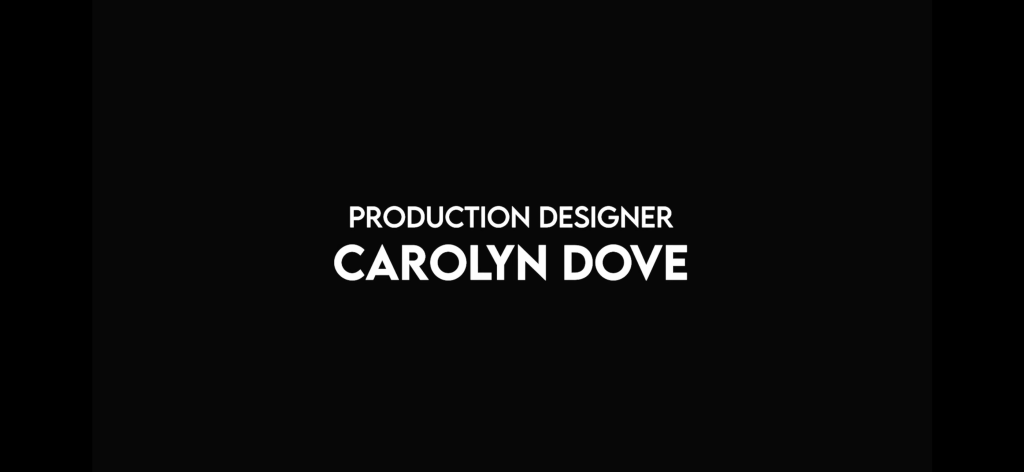 Production Designer Carolyn Dove. This is her name card.